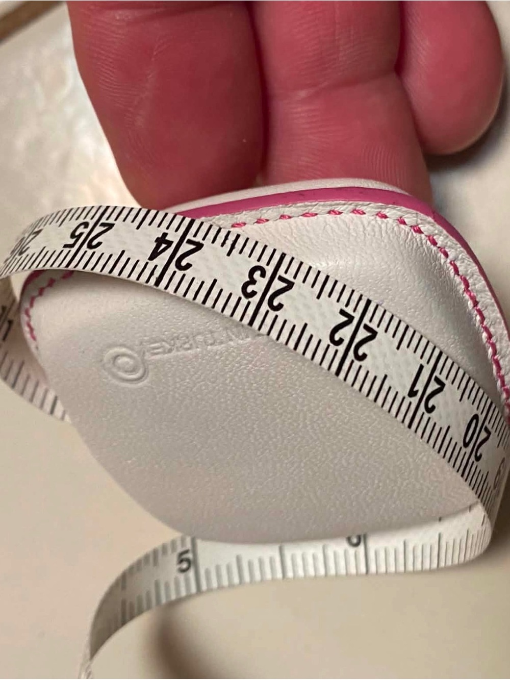 Coach White and Pink Tape Measure